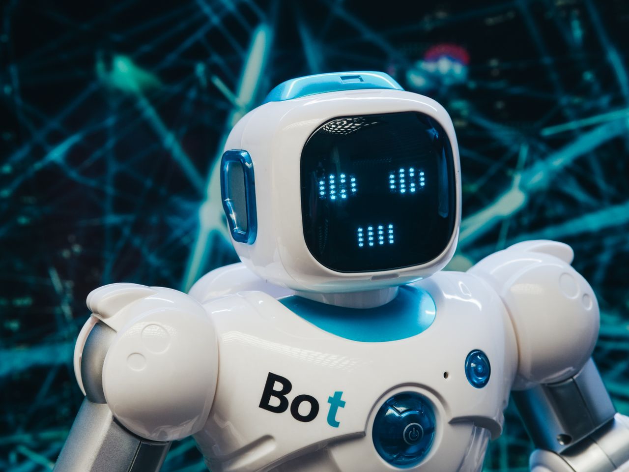 The Art of Drawing Readers In: Your attractive post title goes here Close-up of a futuristic humanoid robot with a digital face display, representing modern technology.
