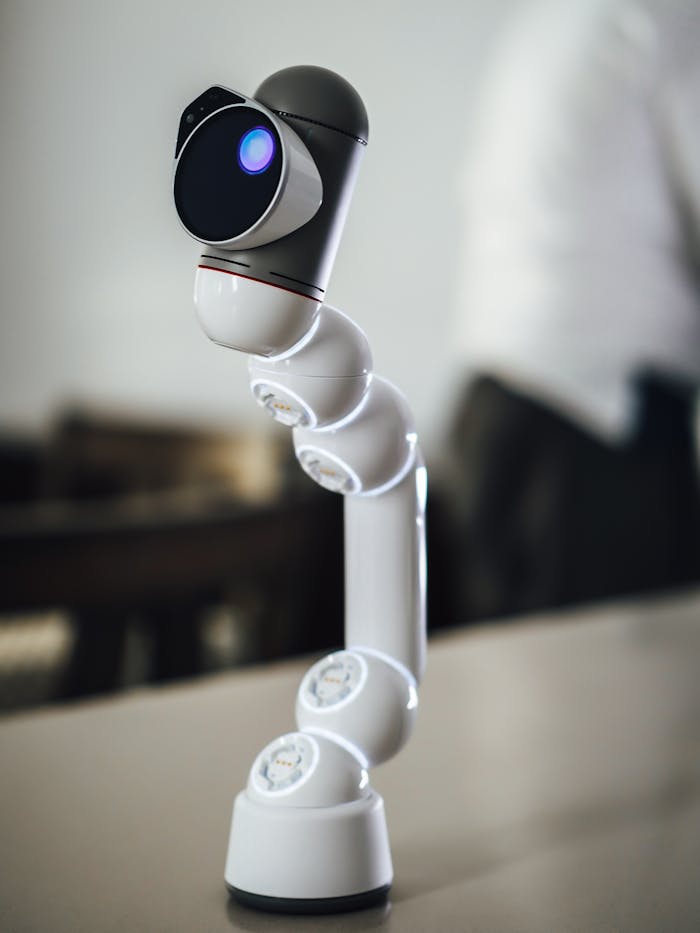 Crafting Captivating Headlines: Your awesome post title goes here Futuristic robotic arm in an office setting, showcasing advanced technology.